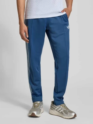 Spodnie dresowe o kroju regular fit z dodatkiem bawełny, model 'FIGC OG' adidas Originals