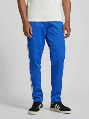 Spodnie dresowe o kroju regular fit z elastycznym pasem model ‘FIGC’ adidas Originals
