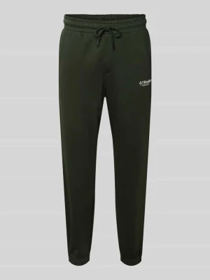 Spodnie dresowe o kroju regular fit z elastycznym pasem model ‘KANE’ jack & jones