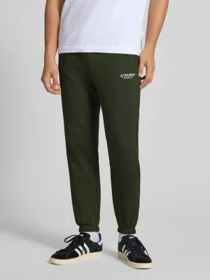 Spodnie dresowe o kroju regular fit z elastycznym pasem model ‘KANE’ jack & jones