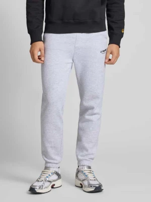 Spodnie dresowe o kroju regular fit z elastycznym pasem model ‘KANE’ jack & jones