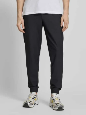 Spodnie dresowe o kroju regular fit z fakturowanym wzorem EA7 Emporio Armani