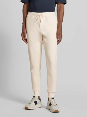 Spodnie dresowe o kroju regular fit z mieszanka bawełny Polo Ralph Lauren Piaskowy