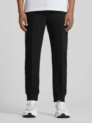 Spodnie dresowe o kroju regular fit z mieszanki bawełny model ‘JOIN HADIKO’ BOSS Green