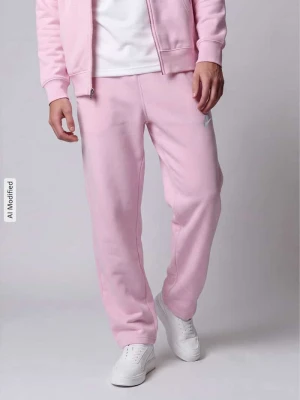Spodnie dresowe o kroju regular fit z mieszanki bawełny Nike Jasnoróżowy