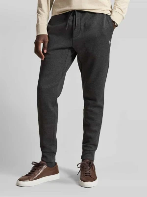 Spodnie dresowe o kroju regular fit z mieszanki bawełny Polo Ralph Lauren Ciemnozielony melanż