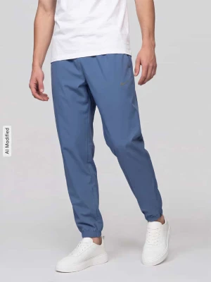 Spodnie dresowe o kroju regular fit z nadruk z logo model 'FORM' Nike Niebieski