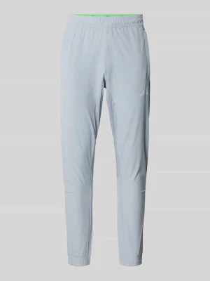 Spodnie dresowe o kroju regular fit z nadrukiem z logo Adidas Training