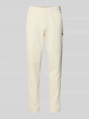 Spodnie dresowe o kroju regular fit z nadrukiem z logo model ‘Pumatech’ PUMA PERFORMANCE