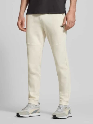 Spodnie dresowe o kroju regular fit z nadrukiem z logo model ‘Pumatech’ PUMA PERFORMANCE