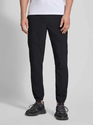 Spodnie dresowe o kroju regular fit z nadrukiem z logo model 'Vibe' Under Armour