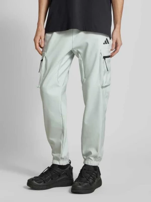 Spodnie dresowe o kroju regular fit z tunelem adidas Sportswear