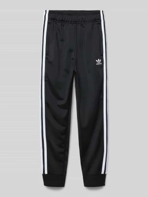 Spodnie dresowe o kroju regular fit z wyhaftowanym logo adidas Originals