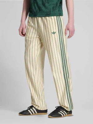 Spodnie dresowe o kroju regular fit z wyhaftowanym logo adidas Originals Złamany biały