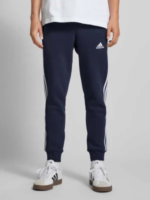 Spodnie dresowe o kroju regular fit z wyhaftowanym logo ADIDAS SPORTSWEAR