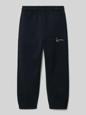 Spodnie dresowe o kroju regular fit z wyhaftowanym logo Karl Kani