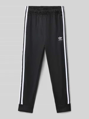 Spodnie dresowe o kroju regular fit z wyhaftowanym logo model ‘Track’ adidas Originals