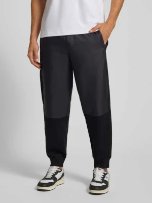Spodnie dresowe o kroju relaxed fit z elastycznym pasem model ‘Felpa’ Armani Exchange