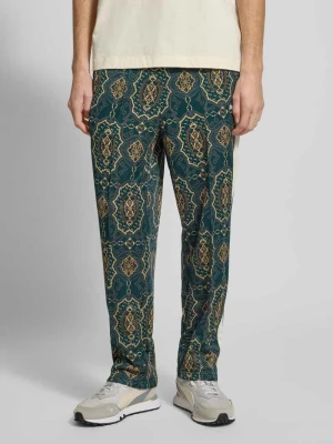 Spodnie dresowe o kroju relaxed fit z elastycznym pasem PUMA PERFORMANCE