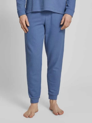 Spodnie dresowe o kroju relaxed fit z fakturowanym wzorem model ‘Austin’ HUGO