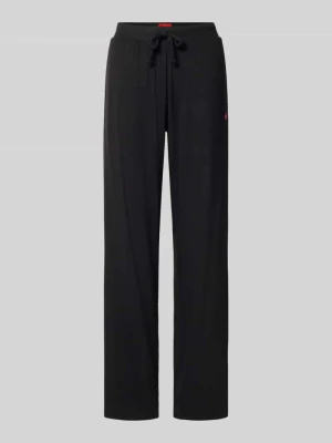 Spodnie dresowe o kroju relaxed fit z mieszanka modalu model 'HUGO HEART' czarny