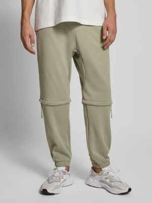 Spodnie dresowe o kroju relaxed fit z nadrukiem z logo adidas Sportswear