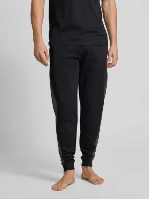 Spodnie dresowe o kroju relaxed fit z nadrukiem z logo Boss