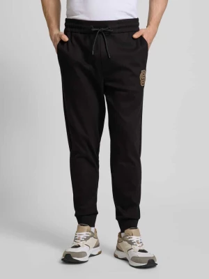 Spodnie dresowe o kroju relaxed fit z naszywką z logo model ‘Lamont’ Boss