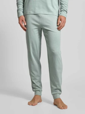 Spodnie dresowe o kroju relaxed fit z tunelem Christian Berg Men
