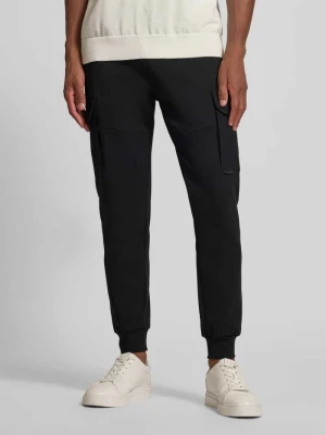 Spodnie dresowe o kroju slim fit z kieszeniami cargo Antony Morato