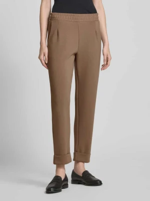 Spodnie dresowe o kroju slim fit z kontrafałdą Christian Berg Woman
