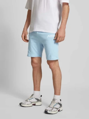 Spodnie dresowe o kroju slim fit z nadrukiem z logo model ‘GORDON’ jack & jones