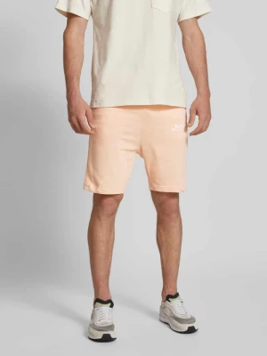 Spodnie dresowe o kroju slim fit z nadrukiem z logo model ‘GORDON’ jack & jones