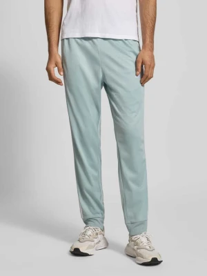 Spodnie dresowe o kroju slim fit z wyhaftowanym logo adidas Sportswear