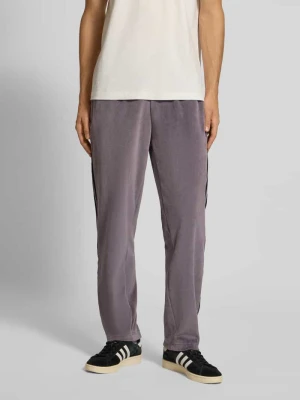 Spodnie dresowe o kroju straight fit z elastycznym pasem adidas Originals