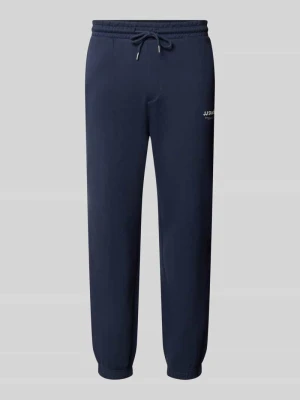 Spodnie dresowe o kroju straight fit z mieszanki bawełny model 'Kane' Jack&Jones Ciemnoniebieski