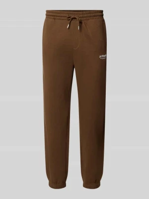 Spodnie dresowe o kroju straight fit z mieszanki bawełny model 'Kane' Jack&Jones Jasnobrązowy