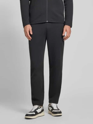 Spodnie dresowe o kroju tapered z dodatkiem bawełny Lacoste Sport