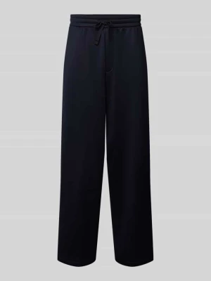 Spodnie dresowe o kroju wide fit z elastycznym pasem Armani Exchange Ciemnoniebieski
