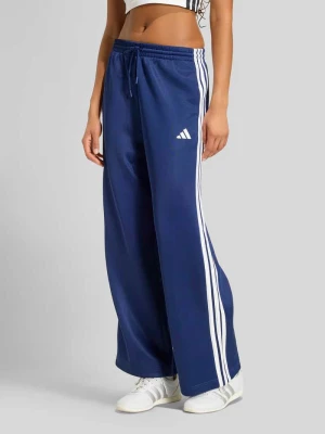 Spodnie dresowe o luźnym kroju z mieszanka bawełny z wyhaftowane logo Adidas Ciemnoniebieski
