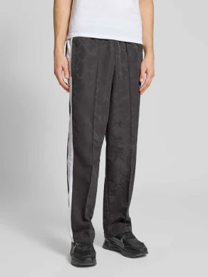 Spodnie dresowe o prostym kroju z wyhaftowanym logo PUMA PERFORMANCE