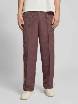 Spodnie dresowe o prostym kroju z wyhaftowanym logo PUMA PERFORMANCE