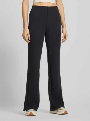 Spodnie dresowe o rozkloszowanym kroju z logo adidas Sportswear