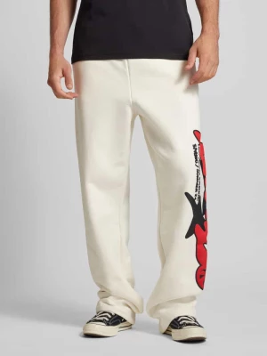 Spodnie dresowe o rozkloszowanym kroju z nadrukiem z motywem z logo model ‘ASTRO’ Low Lights Studios