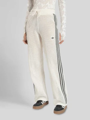 Spodnie dresowe o wyglądzie dzianiny w kroju regular fit model 'FIREBIRD' adidas Originals