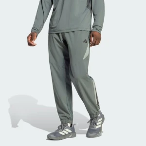 SPODNIE DRESOWE TECH ESSENTIALS WORKOUT Adidas Legend Ivy