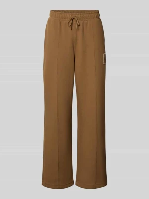 Spodnie dresowe w kroju loose fit z mieszanka bawełny model 'Tenn' Lacoste