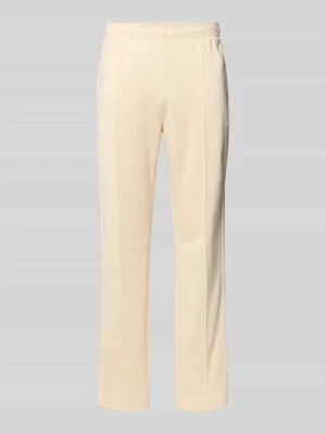 Spodnie dresowe w kroju regular fit z dodatkiem bawełny Lacoste