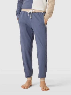 Spodnie dresowe z detalami w kontrastowym kolorze CALIDA