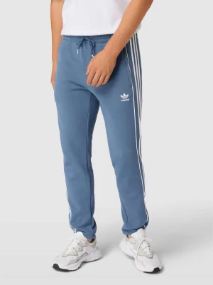 Spodnie dresowe z detalami z logo adidas Originals